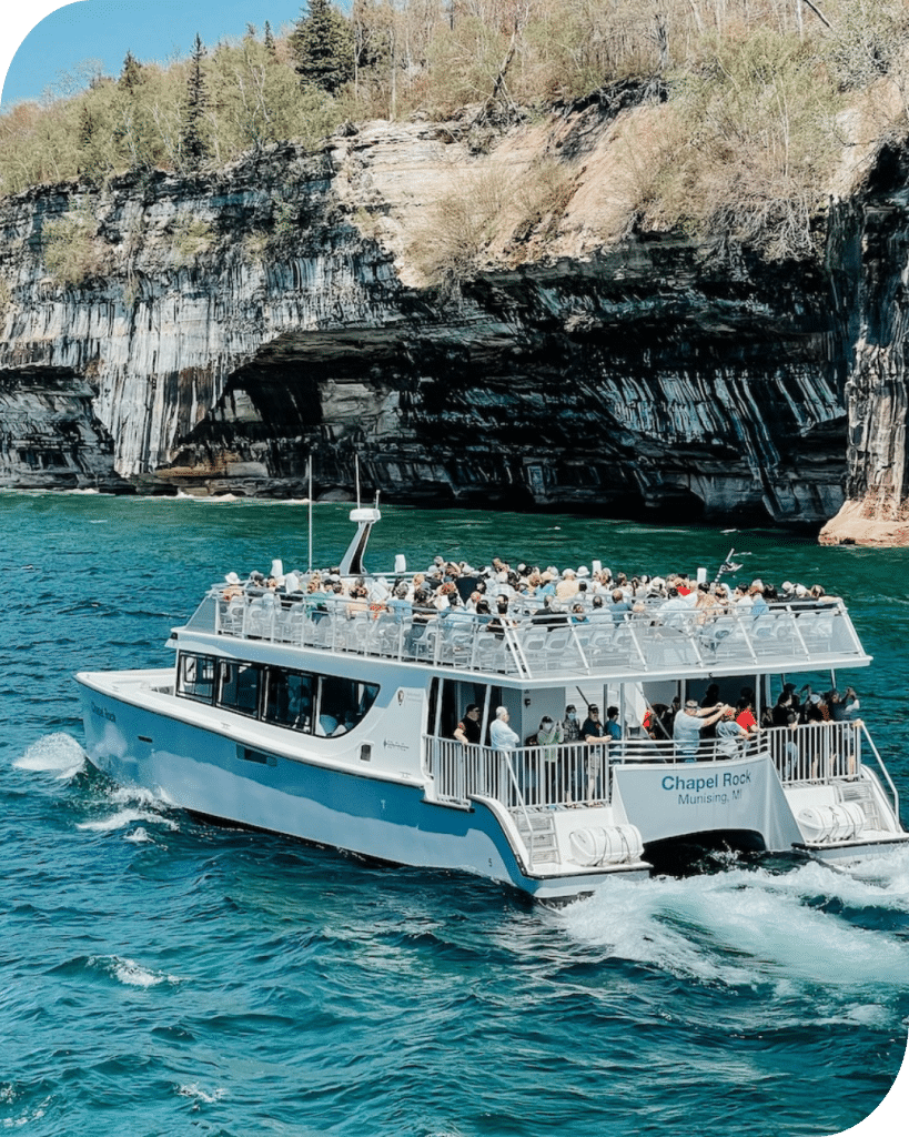 Pictured Rocks Cruises boat coasting past the Pictured Rocks National Lakeshore