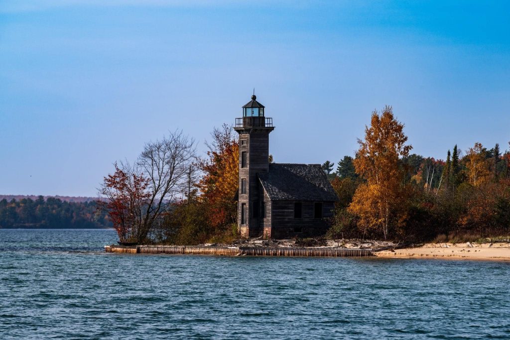 The rustic and weathered Grand Island East Channel Lighthouse is a favorite photo stop on cruises near Munising.
